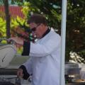 Fred Rose cooking up hamburgers & hotdogs for the crowds